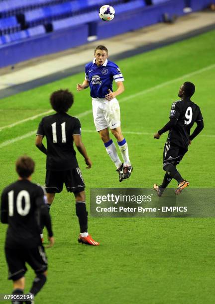 Everton's Matthew Pennington and Chelsea's Islam Feruz, John Smith and Isiah Brown in action.