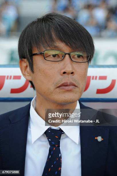 Head coach Fumitake Miura of Albirex Niigata looks on prior to the J.League J1 match between Kawasaki Frontale and Albirex Niigata at Todoroki...
