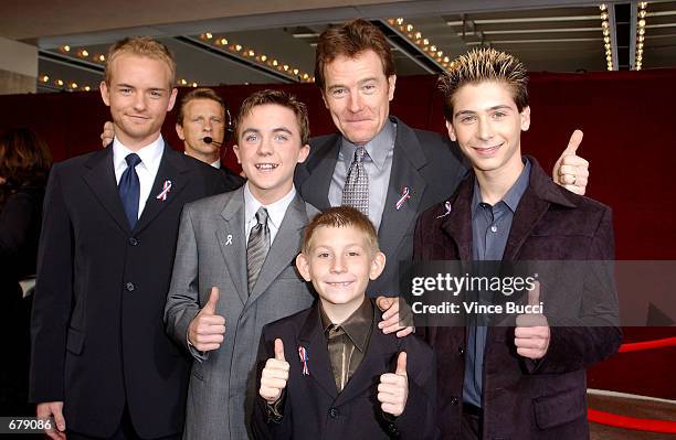 The cast of "Malcolm In The Middle" give a thumbs up sign at the 53rd Annual Primetime Emmy Awards at the Shubert Theater November 4, 2001 in Los...