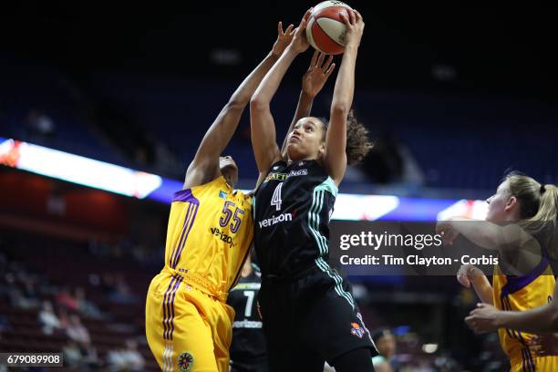 May 2: Nayo Raincock-Ekunwe of the New York Liberty, challenged by Saicha Grant-Allen of the Los Angeles Sparks during the Los Angeles Sparks Vs New...