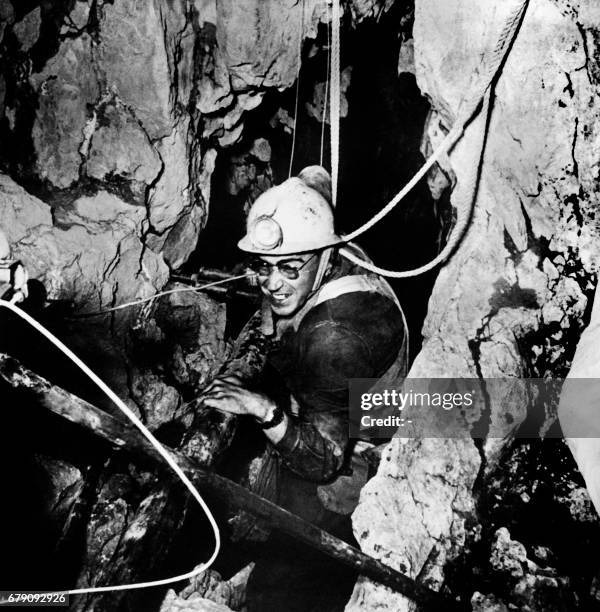 Undated picture shows French speleologist Marcel Loubens exploring a cave.