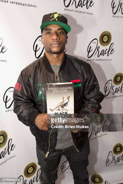 Charlamagne Tha God signs copies of "Black Priviledge" at Capitale on May 4, 2017 in Washington, DC.