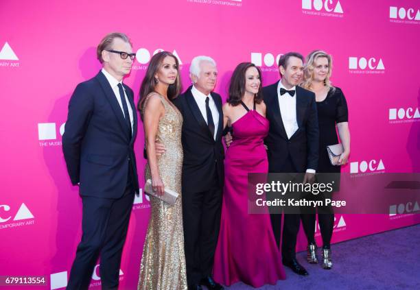 Philippe Vergne, Vaitiare Hirshon, Maurice Marciano, Lilly Tartikoff Karatz, Jeff Koons and Justine Wheeler Koons attend The Museum of Contemporary...