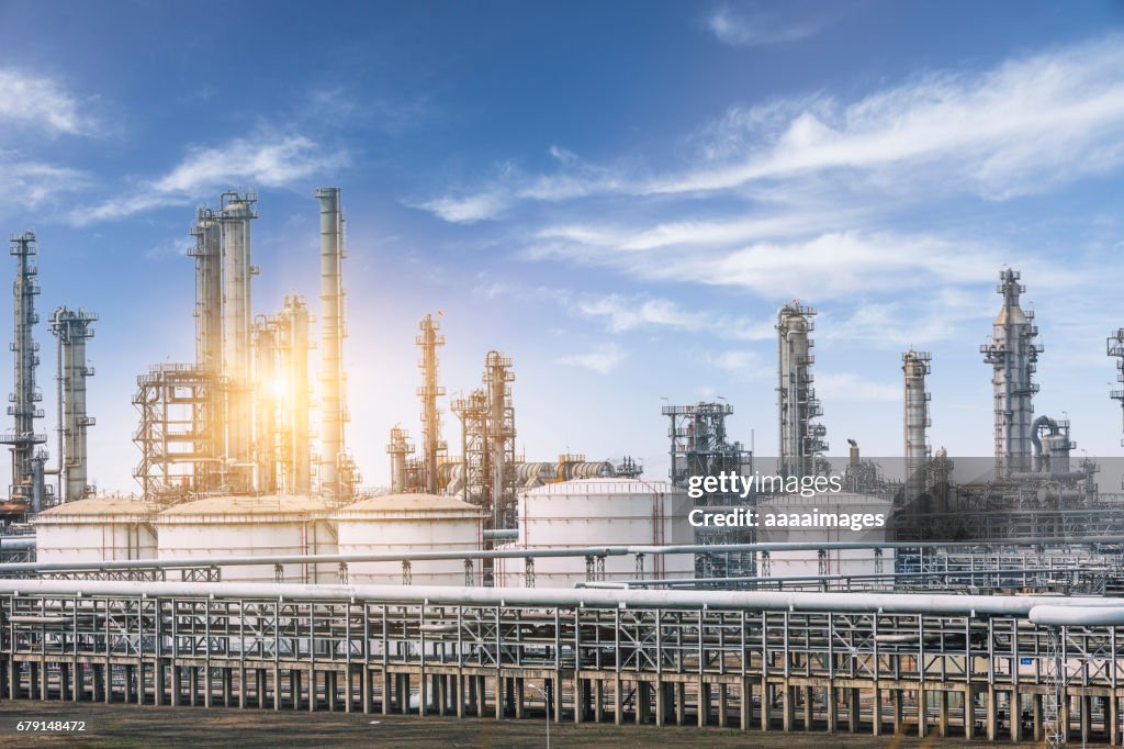 Landscape of a petrochemical plant against sky