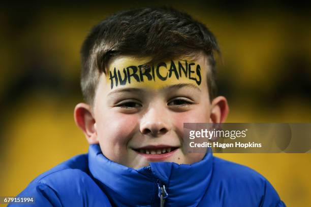 Young Hurricanes fan poses during the round 11 Super Rugby match between the Hurricanes and the Stormers at Westpac Stadium on May 5, 2017 in...