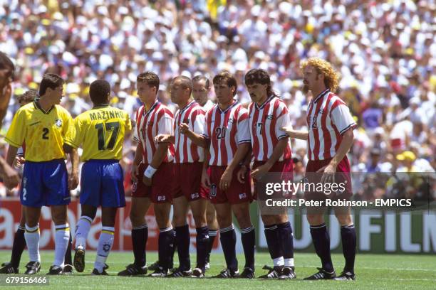 The United States line up a defensive wall. Brazil Jorginho and Mazinho. , Mike Sorber, Earnie Stewart, Paul Caligiuri, Marcelo Balboa and Alexi...