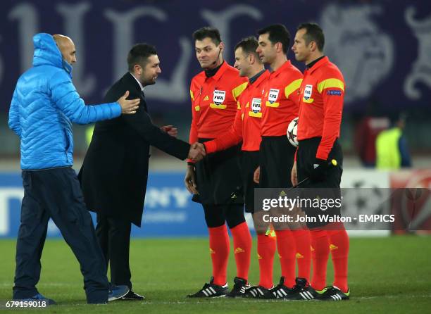 Zenit St Petersburg Head Coach Luciano Spalletti and Austria Vienna Head Coach Nenad Bjelica shake hands with the referee and his assistants at the...