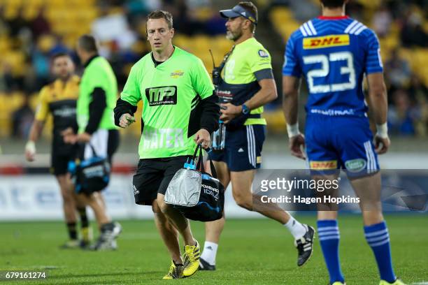 Strength and conditionaing coach Dave Wildash returns to the bench during the round 11 Super Rugby match between the Hurricanes and the Stormers at...