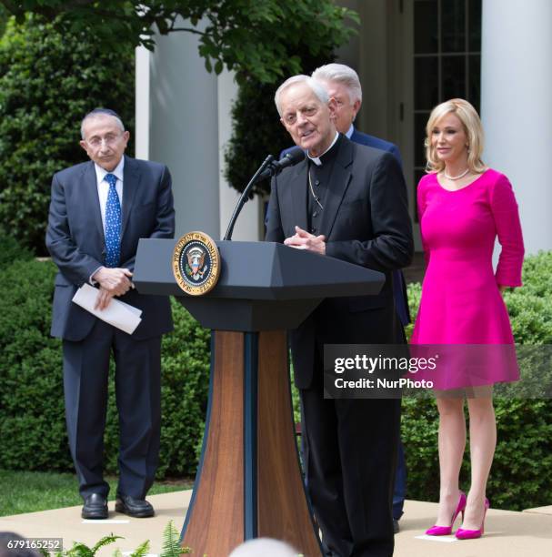 Cardinal Donald Wuerl prayed, with Rabbi Marvin Hier, Pastor Jack Graham, and Pastor Paula White, by his side, at the National Day of Prayer...