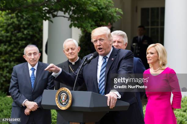 President Trump, at the National Day of Prayer ceremony, in the Rose Garden of the White House, On Thursday, May 4, 2017.