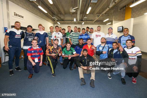 Hurricanes players pose in their club colours during the round 11 Super Rugby match between the Hurricanes and the Stormers at Westpac Stadium on May...