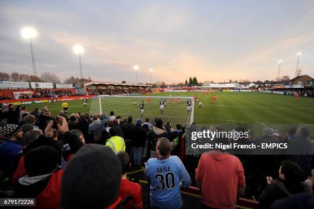 Fans watch the match from the stands