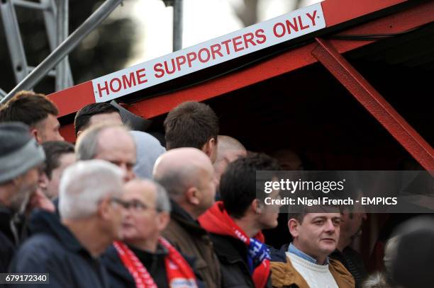 Signage in the stands at the Lamb Ground