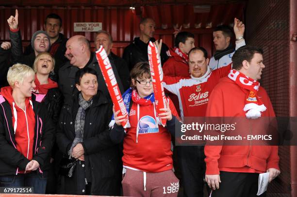 Tamworth fans show their support in the stands before the game