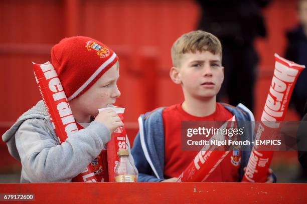 Young Tamworth fans wait for the game to start in the stands