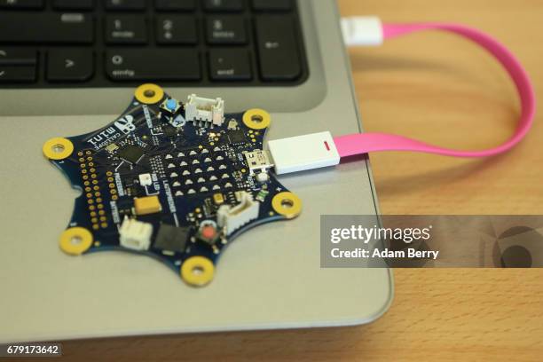 Calliope mini" computer is seen during a demonstration of the device on May 5, 2017 in Berlin, Germany. The USB-connected circuit board, similar to a...