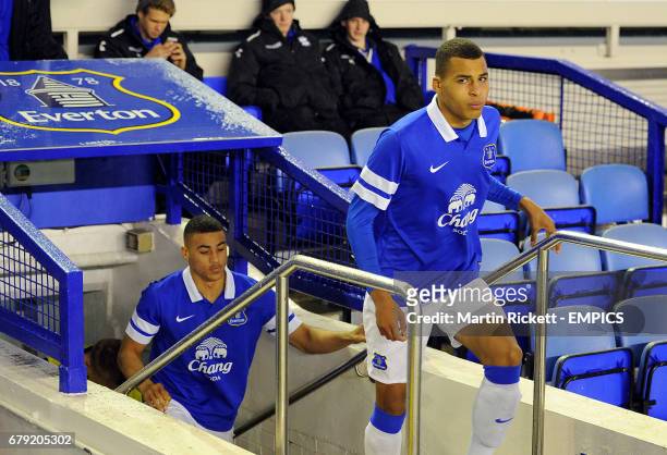 Everton's Tyrone Duffus and Courtney Duffus walk out on to the pitch before kick-off