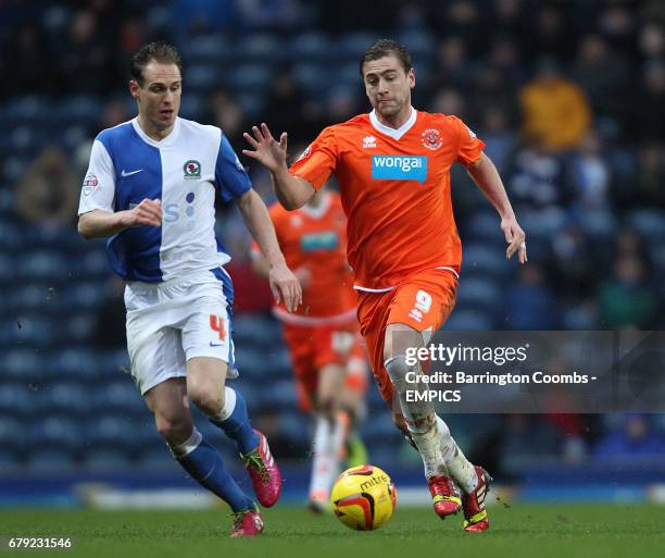 Blackburn Rovers' Matt Kilgallon and Blackpool's Steve Davis in action
