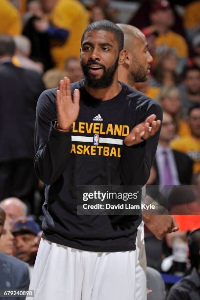 Kyrie Irving of the Cleveland Cavaliers claps during Game Two of the Eastern Conference Semifinals against the Toronto Raptors during the 2017 NBA...