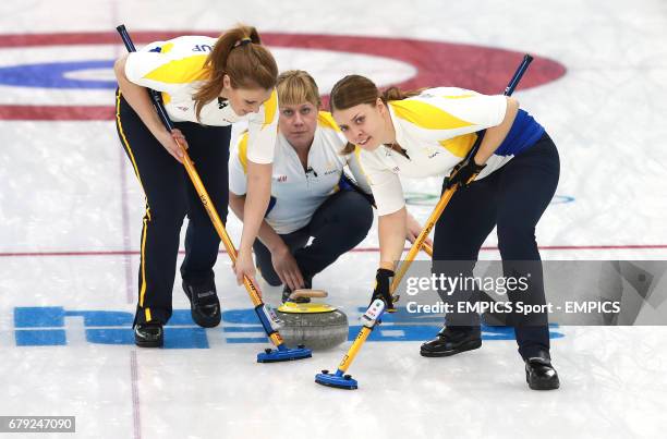 Sweden's Maria Prytz watches her stone during their match with Korea. Picture date: Wednesday February 12, 2014. Photo credit should read: EMPICS