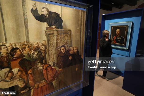 The painting "Luther Preaching from the Pulpit" by Alexandre Struys, hangs on display at the exhibition "Luther and the Germans" at Wartburg Castle...