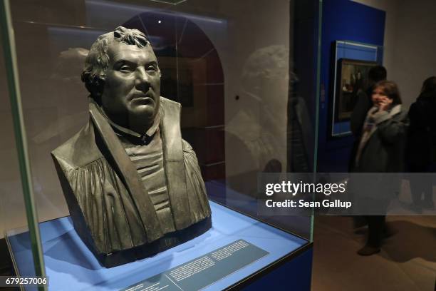 19th-century bust of Martin Luther stands on display at the exhibition "Luther and the Germans" at Wartburg Castle on May 5, 2017 in Eisenach,...