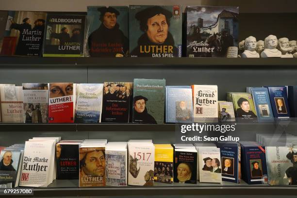 Books about religious reformer Martin Luther stand on display in the gift shop at the exhibition "Luther and the Germans" at Wartburg Castle on May...