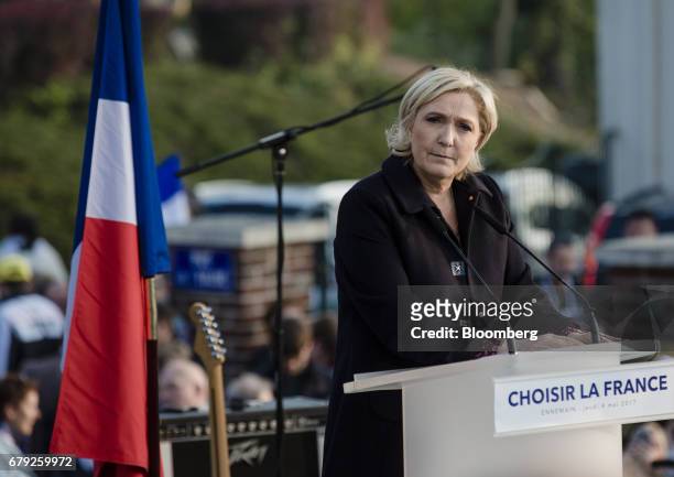 Marine Le Pen, French presidential candidate, pauses during an election campaign event in Ennemain, France, on Thursday, May 4, 2017. Le Pen...