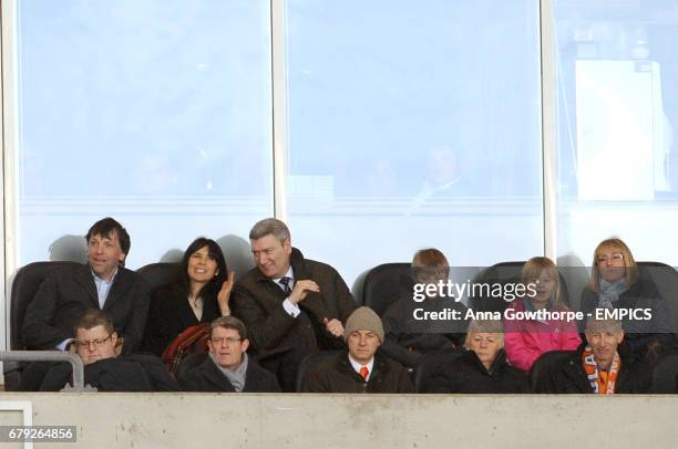 Blackpool owner Karl Oyston along with Manchester City executive staff member Brian Marwood look on from the VIP area