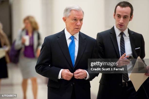 Senate Budget ranking member Jeff Sessions, R-Ala., arrives with his aide Stephen Miller for a news conference April 5 with House Budget Chairman...