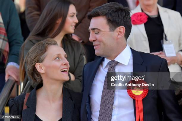 Labour's Andy Burnham celebrates winning the Greater Manchester mayoral election with wife Marie-France van Heel outside Manchester Central on May 5,...