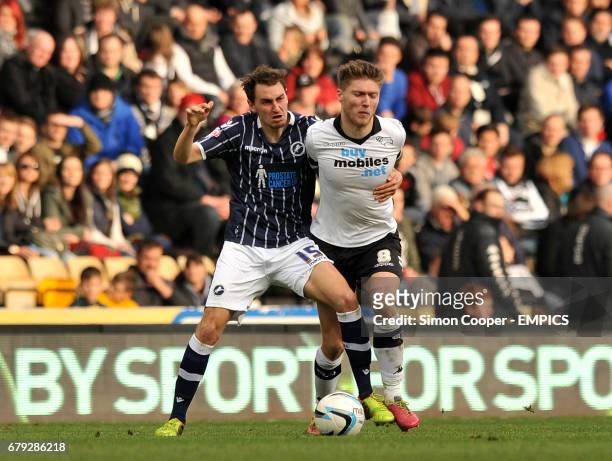 Millwall's Ed Upson and Derby County's Jeff Hendrick battle for the ball
