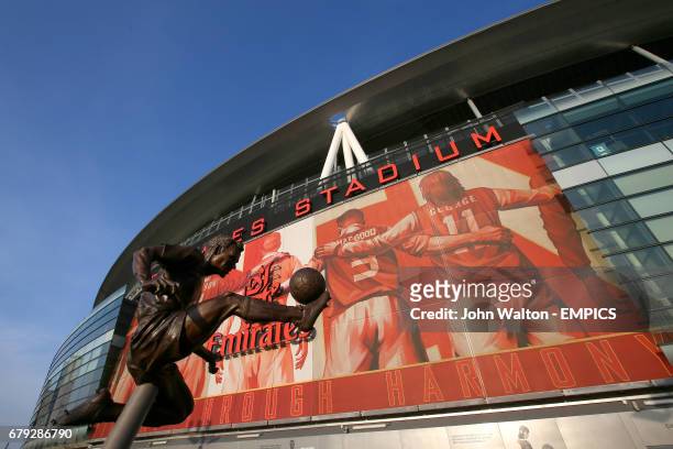 The Dennis Bergkamp statue is seen outside of The Emirates Stadium