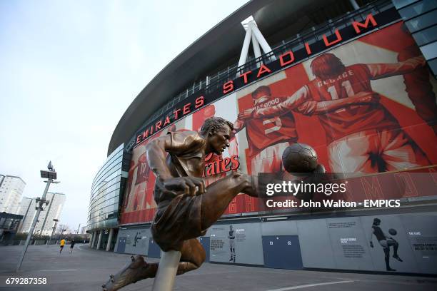 The Dennis Bergkamp statue is seen outside of The Emirates Stadium