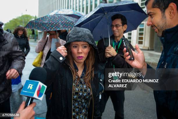 Rosa Isela Guzman Ortiz, who claims to be one of the daughters of ÔEl ChapoÕ , speaks with reporters outside the US Federal Courthouse in Brooklyn...