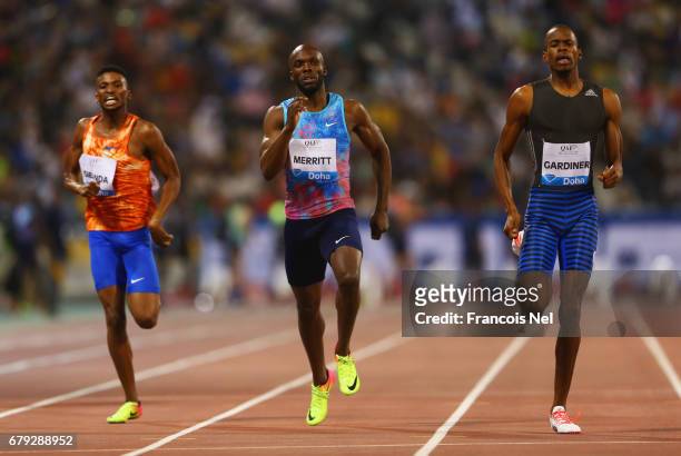 Karabo Sibanda of Botswana, LaShawn Merritt of the United States and Steven Gardiner of the Bahamas compete in the Men's 400 metres during the Doha -...