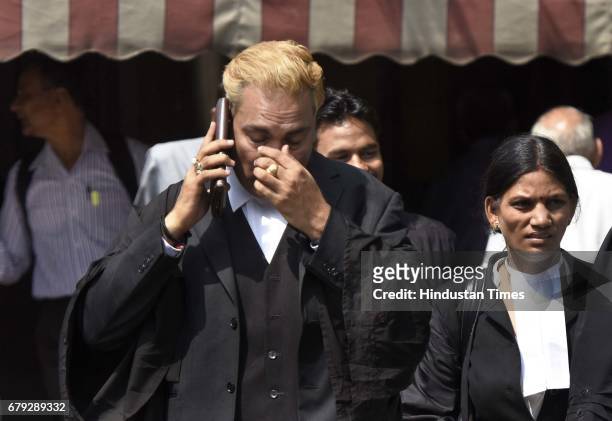 Convicts lawyer A. P. Singh after the Supreme Court pronounced verdict on the appeals filed by four death row convicts against death penalty in the...