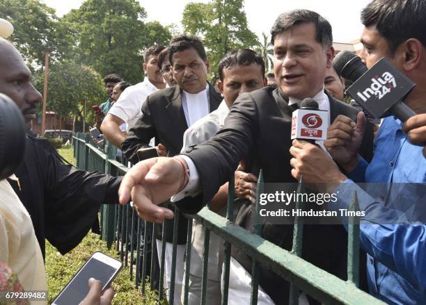 Senior advocate Sidharth Luthra briefing to media persons after the Supreme Court pronounced verdict on the appeals filed by four death row convicts...