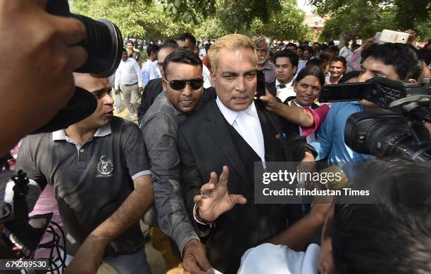 Convicts lawyer A. P. Singh briefing media persons after the Supreme Court pronounced verdict on the appeals filed by four death row convicts against...