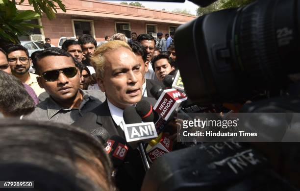 Convicts lawyer A. P. Singh briefing media persons after the Supreme Court pronounced verdict on the appeals filed by four death row convicts against...