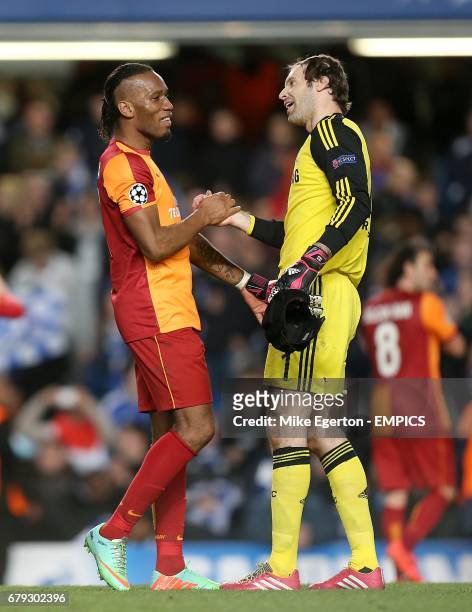 Chelsea's goalkeeper Petr Cech with Galatasaray's Didier Drogba after the final whistle.