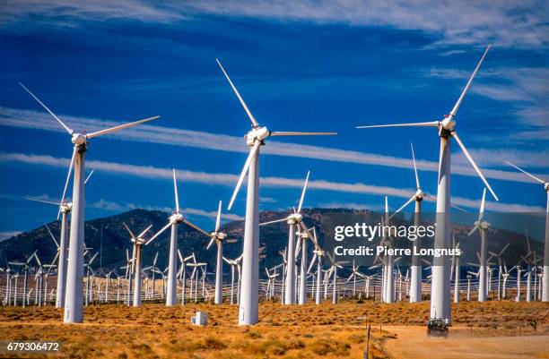large wind turbines in the california desert - wind turbine california stock pictures, royalty-free photos & images