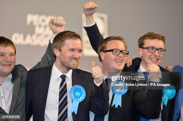 Conservative party members Robert Connely, David Meikle, Thomas Kerr and Euan Blockley celebrate victory after ballot papers were counted in the...