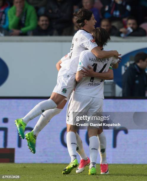 Martin Harnik of Hannover celebrates his team's second goal with team mates Marko Maric and Edgar Prib during the Second Bundesliga match between 1....