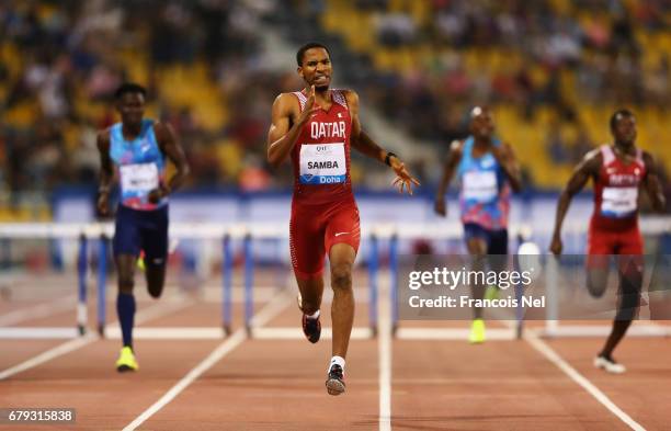 Abderrahman Samba of Qatar races to the line to win the Men's 400 metre hurdles during the Doha - IAAF Diamond League 2017 at the Qatar Sports Club...