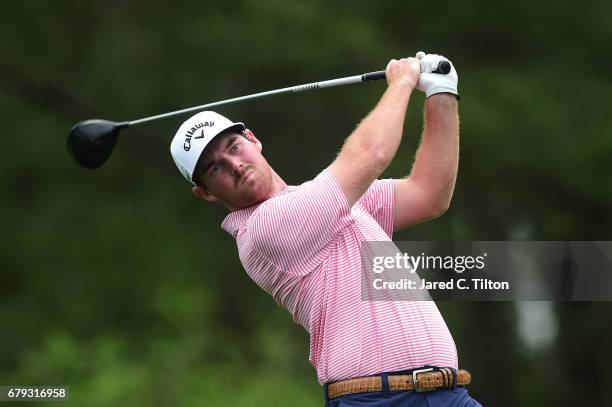 Grayson Murray plays his shot from the fourth tee during round two of the Wells Fargo Championship at Eagle Point Golf Club on May 5, 2017 in...