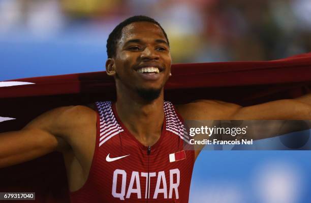 Abderrahman Samba of Qatar celebrates victory after the Men's 400 metre hurdles during the Doha - IAAF Diamond League 2017 at the Qatar Sports Club...