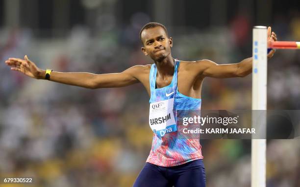 Qatar's Mutaz Barshim competes in the men's high jump during the Diamond League athletics competition at the Suhaim bin Hamad Stadium in Doha, on May...