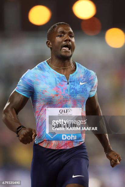 Justin Gatlin competes in the men's 100 metres during the Diamond League athletics competition at the Suhaim bin Hamad Stadium in Doha, on May 5,...