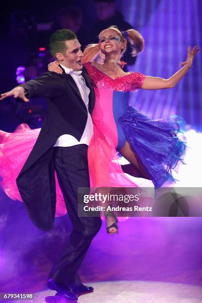 Sarah Latton and Maxi Arland perform on stage during the 7th show of the tenth season of the television competition 'Let's Dance' on May 5, 2017 in...